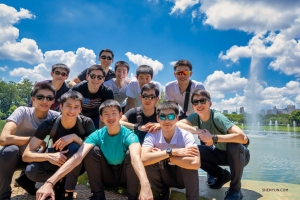 A dozen dancers huddle together in the country that is home to 60% of the Amazon Rainforest.

(Photo by Tony Xue)
